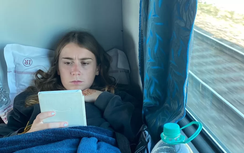 Reading on a overnight train in India, great for travelling on a budget